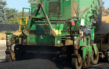 Asphalt truck needing an asphalt release agent to be cleaned